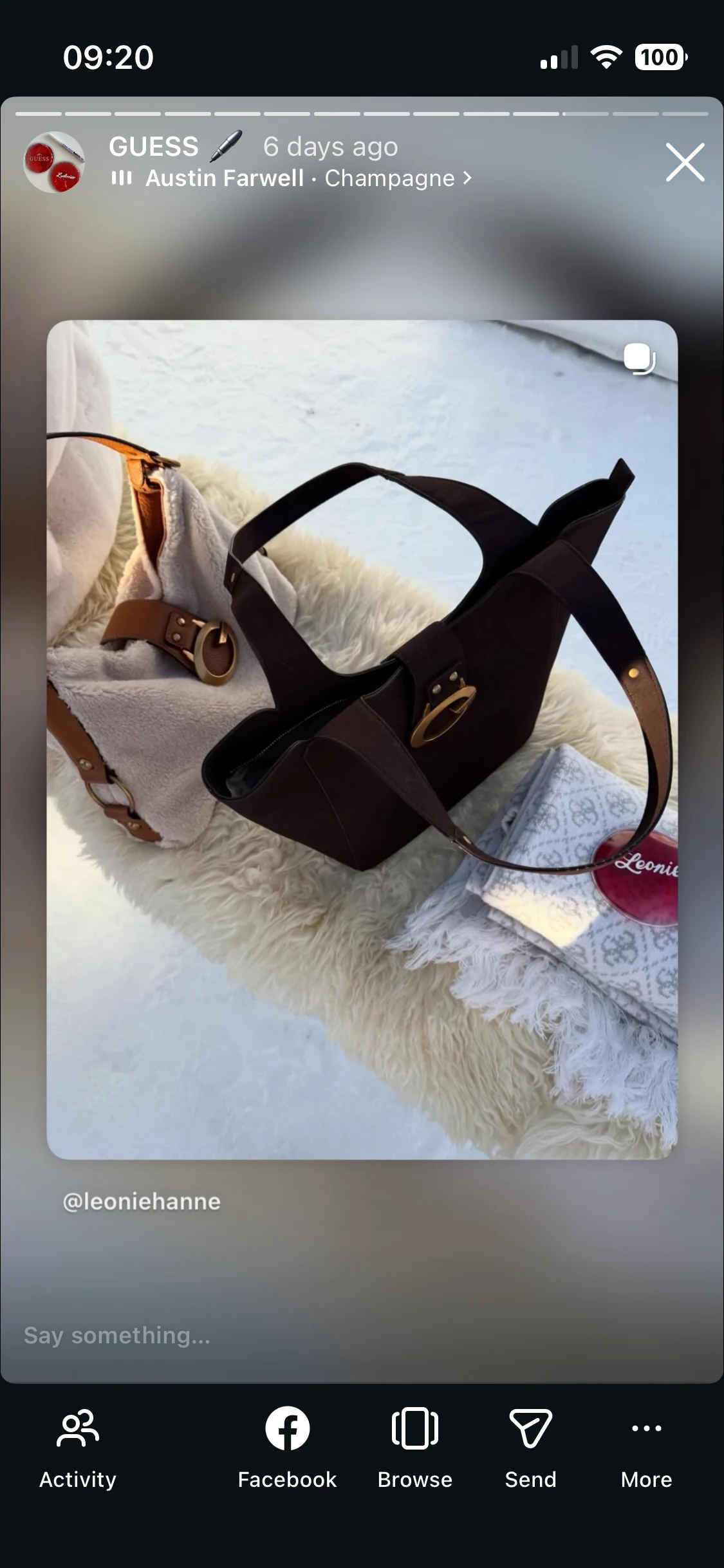 Instagram story showing a personalised GUESS handwarmer beside handbags